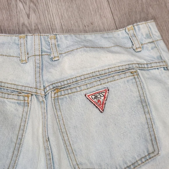 Light Blue Denim Jeans with Logo Patch
